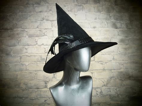 Hauntingly Beautiful: The Elegance of a Specter with a Witch Hat